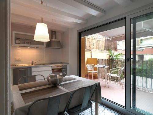 Kuchyň nebo kuchyňský kout v ubytování Rosselló Apartment