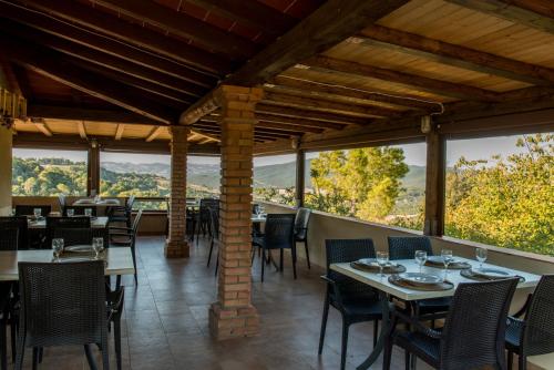 A restaurant or other place to eat at Agriturismo San Carlo