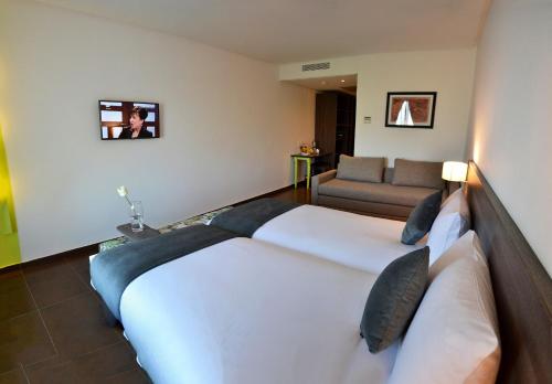 Letto o letti in una camera di Wazo Hotel