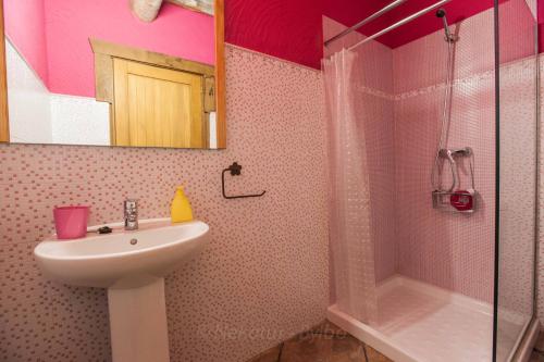 a bathroom with a sink and a shower at Arkaitza in Berrobi