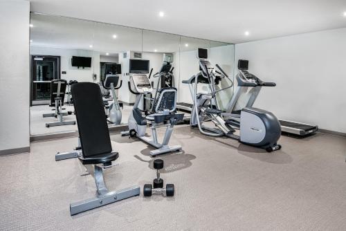 a gym with several treadmills and exercise bikes at Staybridge Suites Austin Round Rock by IHG in Round Rock