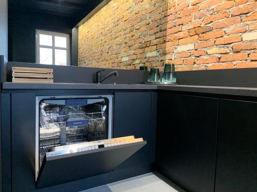 Η κουζίνα ή μικρή κουζίνα στο 5 Star Apartments - Luxury & Comfort