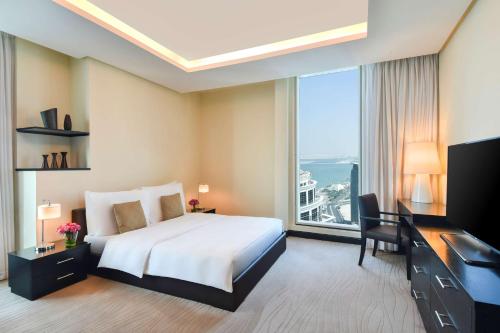Televisyen dan/atau pusat hiburan di Kempinski Residences & Suites, Doha