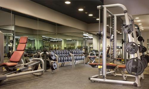 a gym with rows of chairs and machines at Royal Maxim Palace Kempinski Cairo in Cairo