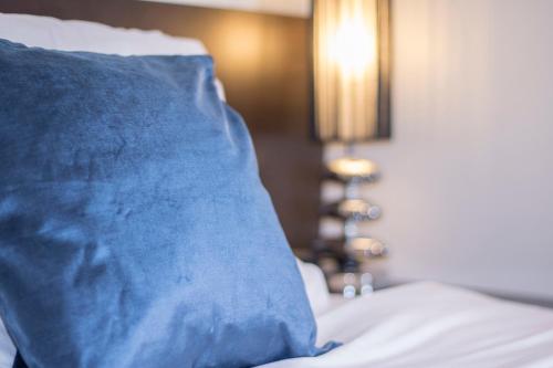 Ένα ή περισσότερα κρεβάτια σε δωμάτιο στο Hotel Waterloo & Backpackers