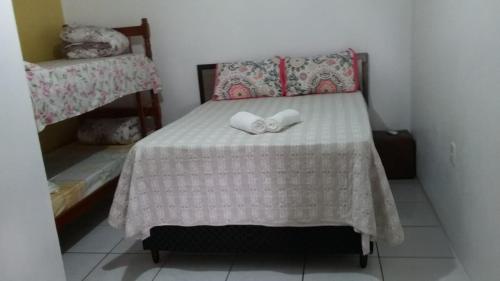 Cama o camas de una habitación en Pousada do Nico
