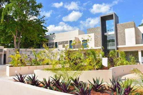 a view of the front of the building at Waye Valladolid Centro - Sustainable, Authentic Experiences & Pet Friendly Boutique Hotel in Valladolid