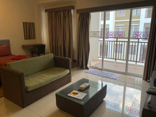 Posezení v ubytování Melaka B Lagoon Irfan Luxury Room