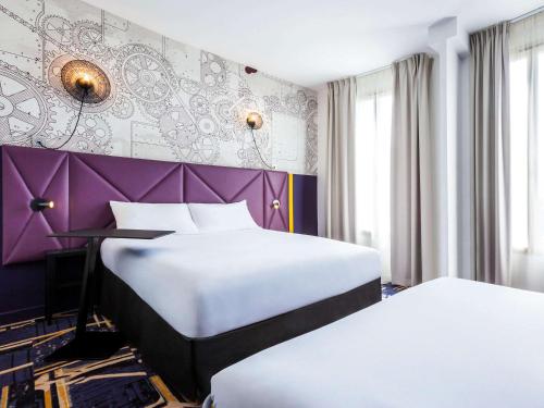 Кровать или кровати в номере ibis Styles Paris Mairie De Clichy