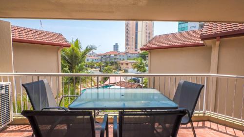 a table and chairs on a balcony with a view at Jubilee Views Holiday Apartments in Gold Coast