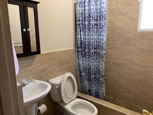 A bathroom at Casa De Pedro Entire Apartment