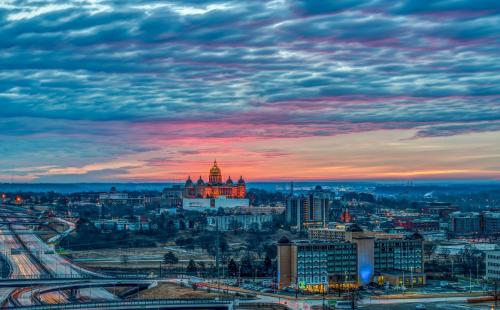 a view of a city with a sunset at Holiday Inn Des Moines-Downtown-Mercy Campus by IHG in Des Moines