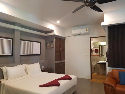 Katil atau katil-katil dalam bilik di Balcony Villa