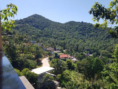 a view of a mountain from a house at Balcony Villa in Koh Tao