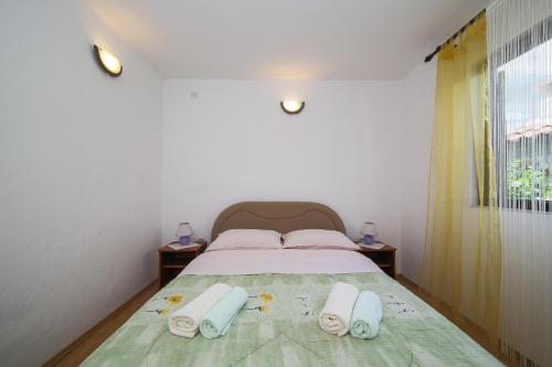 Postel nebo postele na pokoji v ubytování Holiday home Sego