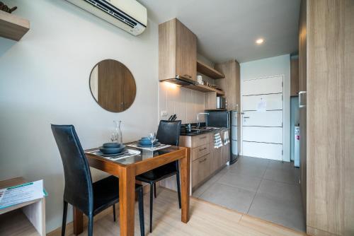 Η κουζίνα ή μικρή κουζίνα στο Apartments at The Bliss Condo by Lofty
