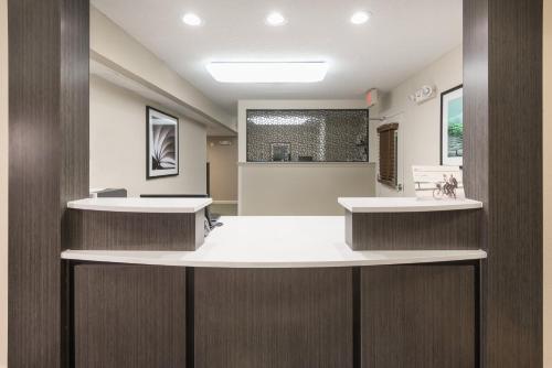 a dental office with two sinks in a room at Candlewood Suites Durham - RTP by IHG in Durham