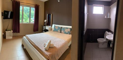 Lova arba lovos apgyvendinimo įstaigoje Hotel Rasa Sayang Artisan Inn Jelebu