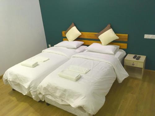 Кровать или кровати в номере Acqua Blu Rasdhoo