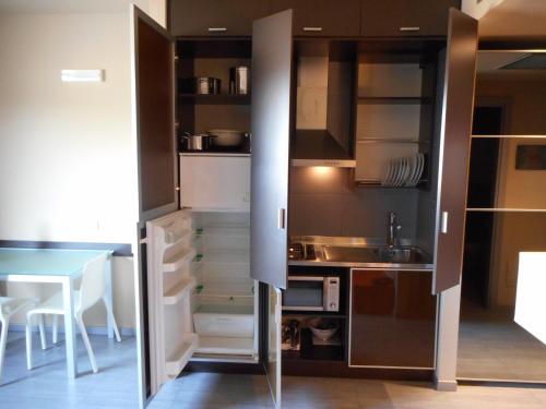 Kuchyň nebo kuchyňský kout v ubytování Residence San Marino