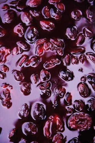 a close up of cherries in a bowl of liquid at Schlegelhof in Kirchzarten