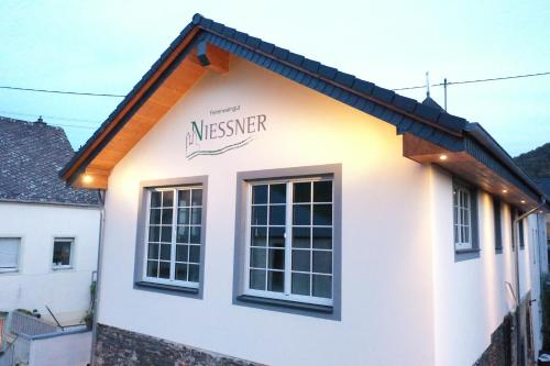 a building with the name of a museum on the side at Ferienweingut Niessner in Ernst