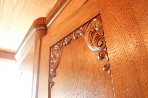 a close up of a wooden door with a wood floor at Ferienweingut Niessner in Ernst