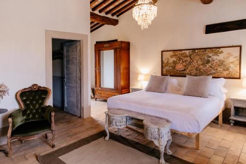 En eller flere senger på et rom på Locanda in Tuscany