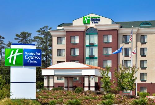 a hotel with a sign in front of it at Holiday Inn Express Hotel & Suites Birmingham - Inverness 280 by IHG in Birmingham