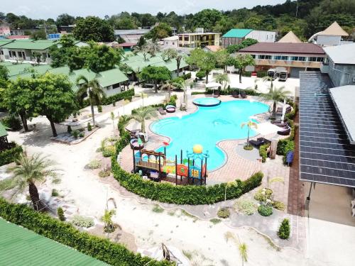 an overhead view of a pool at a resort at Walking Street Hostel in Ko Lipe