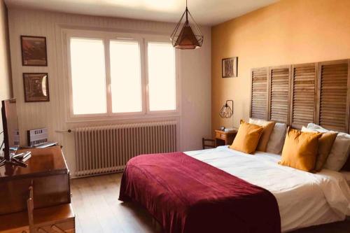 Postel nebo postele na pokoji v ubytování JAZZAPPART appartement classé 3 étoiles