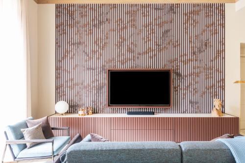 Телевизор и/или развлекательный центр в Palazzo Visconti - by MyHomeInComo