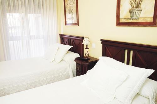 Una cama o camas en una habitación de DC Mesones 21