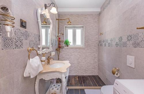 Koupelna v ubytování Apartments More Luxury