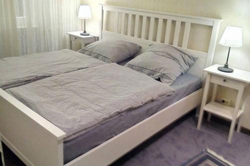 Westerland mit Sonnenbalkonにあるベッド