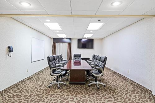 a conference room with a table and chairs at Holiday Inn - St. Petersburg West by IHG in St Petersburg