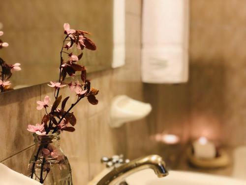 Um banheiro em Kalken Hotel by MH