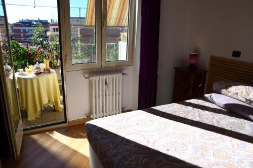 Postel nebo postele na pokoji v ubytování B&B SPLENDIDAE MUNDI