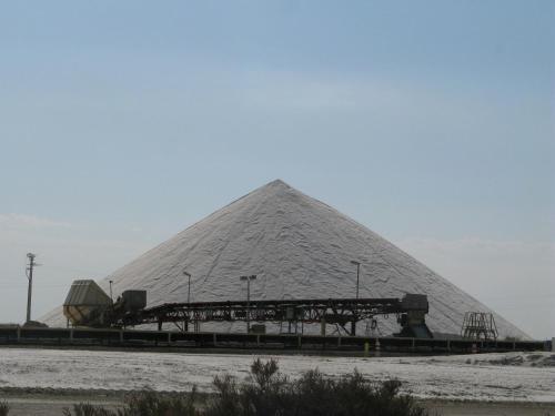 a large pyramid with a bridge in front of it at Hotel Les Templiers in Aigues-Mortes