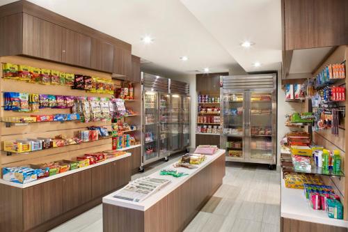 a grocery store with two counters in a store at Holiday Inn Express Waikiki by IHG in Honolulu