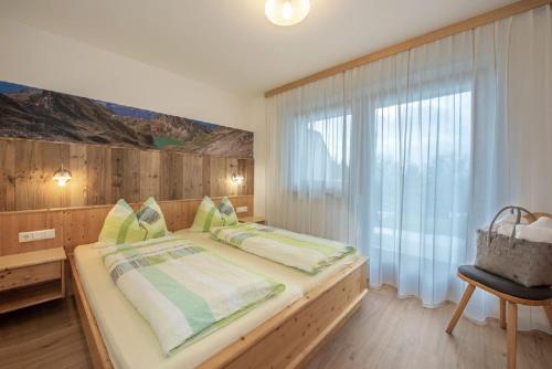 Postel nebo postele na pokoji v ubytování Bergdiamant