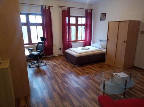 Postel nebo postele na pokoji v ubytování Penzion u Náhonu