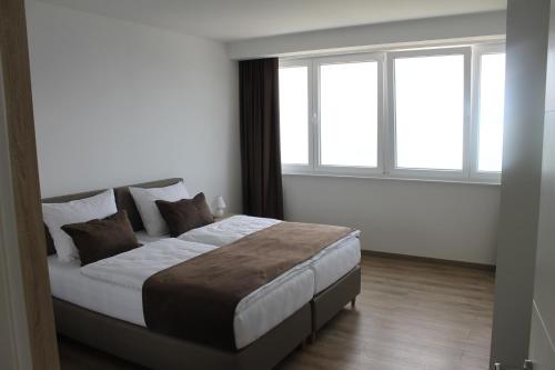 Ένα ή περισσότερα κρεβάτια σε δωμάτιο στο Villa Isabela