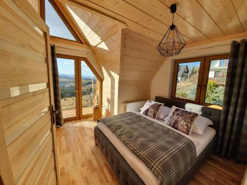 Postel nebo postele na pokoji v ubytování Domek z widokiem na Tatry