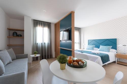 Ένα ή περισσότερα κρεβάτια σε δωμάτιο στο Beach Hotel Alfredo