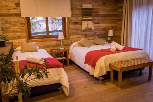 Postel nebo postele na pokoji v ubytování Hotel 381 Panguipulli