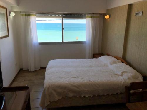 Een bed of bedden in een kamer bij Solana Del Mar