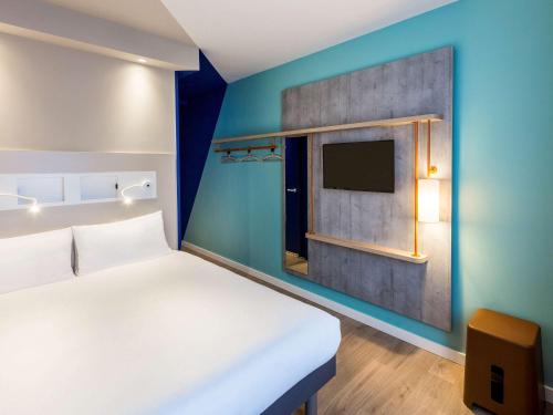 Кровать или кровати в номере ibis budget Amsterdam City South