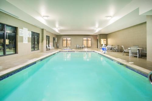 a large swimming pool in a hotel room at Holiday Inn Express & Suites Amarillo West by IHG in Amarillo