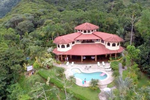 an aerial view of a house with a swimming pool at Villa Los Aires Costa Rica in Caña Blanca